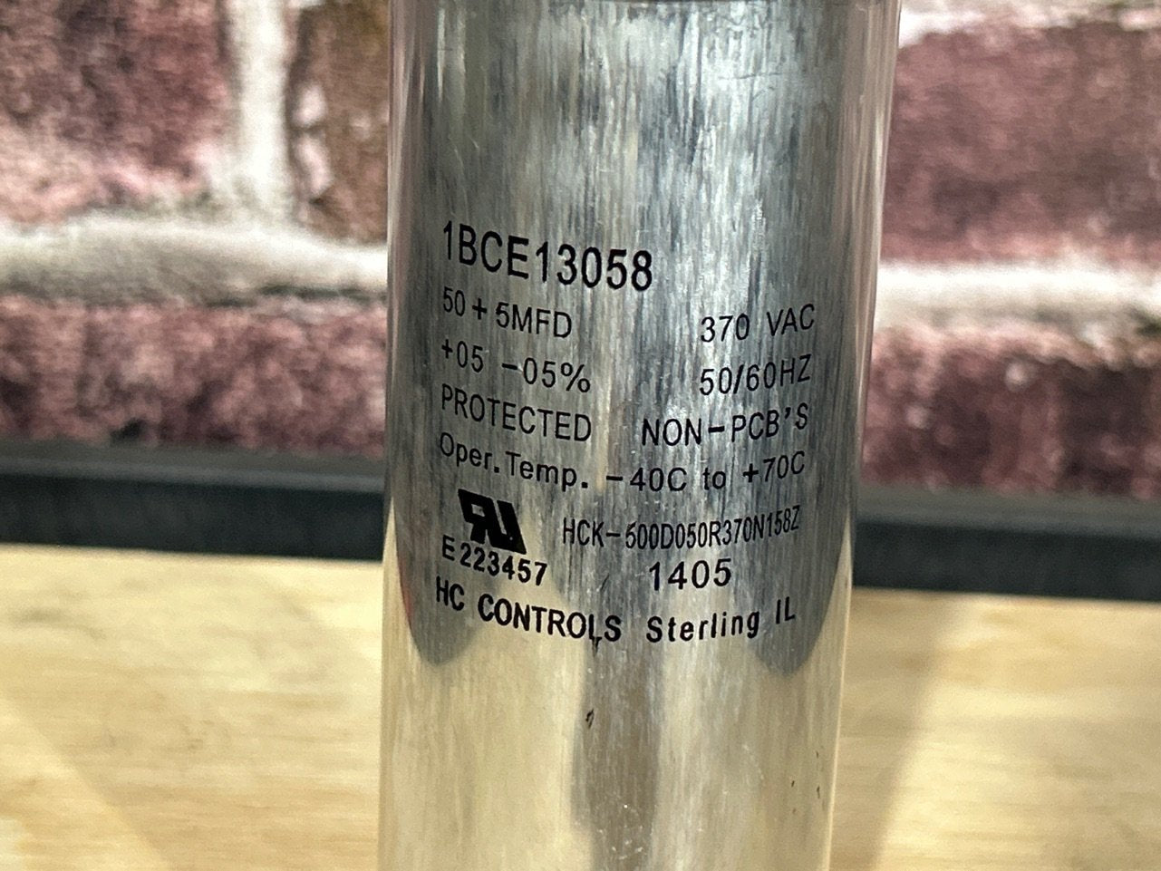 370 Vac, 50+5MFD 50/60 Hz, Round Capacitor