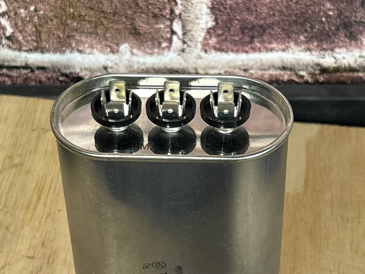 370 Vac, 45+10MFD 50/60 Hz, Oval Capacitor
