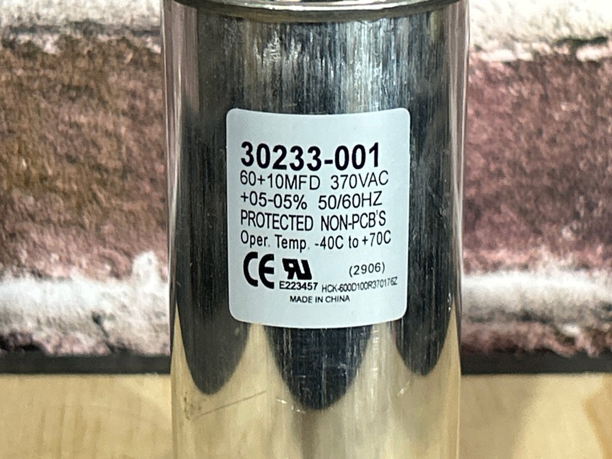 370 Vac, 60+10MFD 50/60 Hz, Round Capacitor