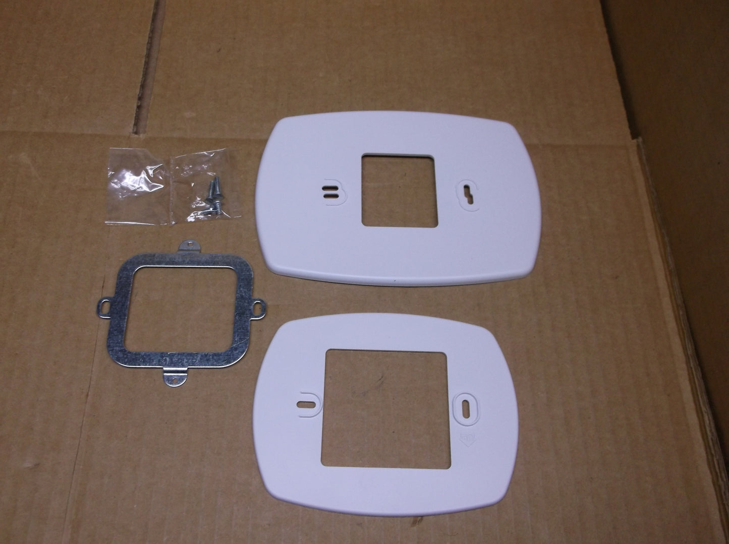 Thermostat Cover Plate Assembly