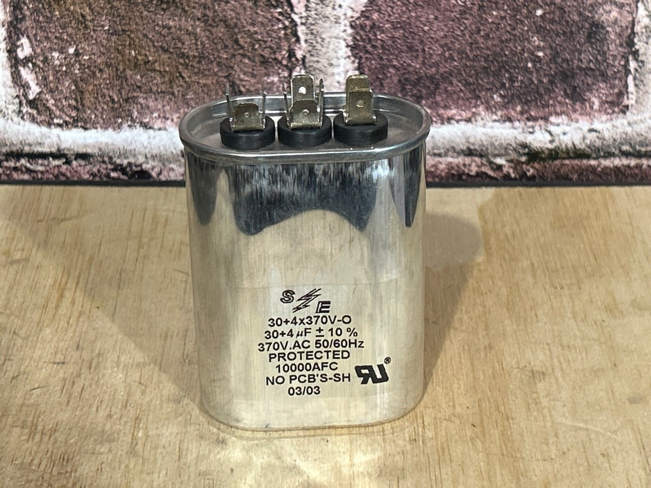 370 Vac, 30+4MFD 50/60 Hz, Oval Capacitor