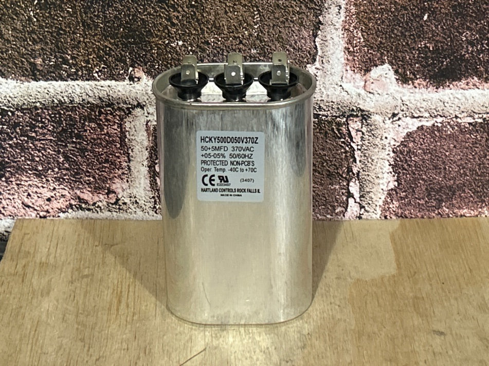 370 Vac, 50+5MFD 50/60 Hz, Oval Capacitor