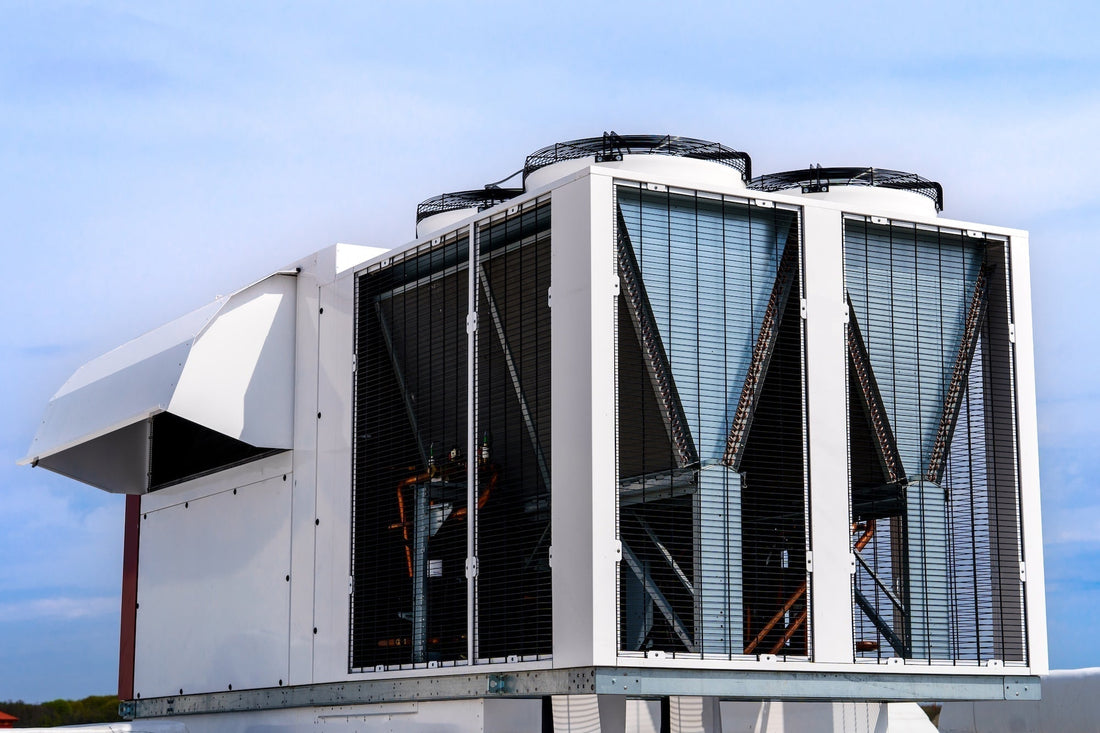 Commercial rooftop 3-ton AC unit condenser used for central air conditioning installation and HVAC cooling systems.