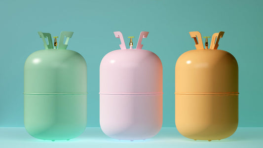 Color-coded refrigerant tanks representing R-410A and R-454B used in HVAC systems