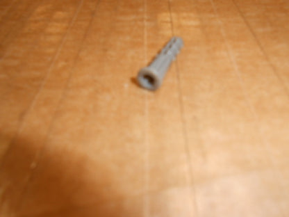 WALL ANCHORS (SMALL GRAY PLASTIC - 100 PER PACK)