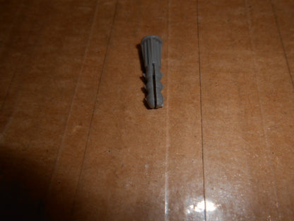 WALL ANCHORS (SMALL GRAY PLASTIC - 100 PER PACK)