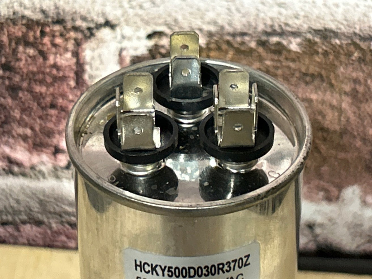 50+3 MFD x 370 VAC Round Dual Run Capacitor