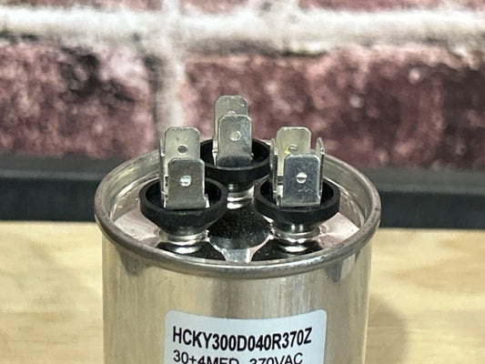370 Vac, 30+4MFD 50/60 Hz, Round Capacitor