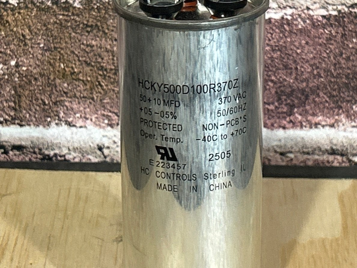 370 Vac, 50+10MFD 50/60 Hz, Round Capacitor
