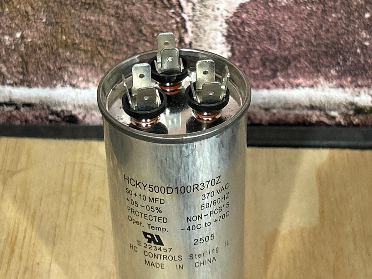 370 Vac, 50+10MFD 50/60 Hz, Round Capacitor
