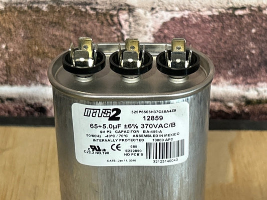370 Vac, 65+5MFD 50/60 Hz, Round Capacitor