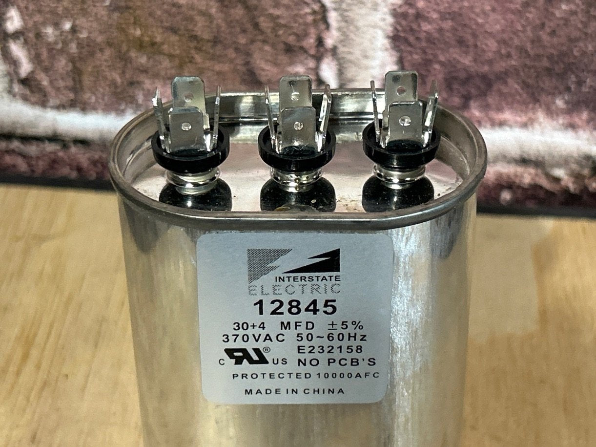 370 Vac, 30+4MFD 50/60 Hz, Oval Capacitor