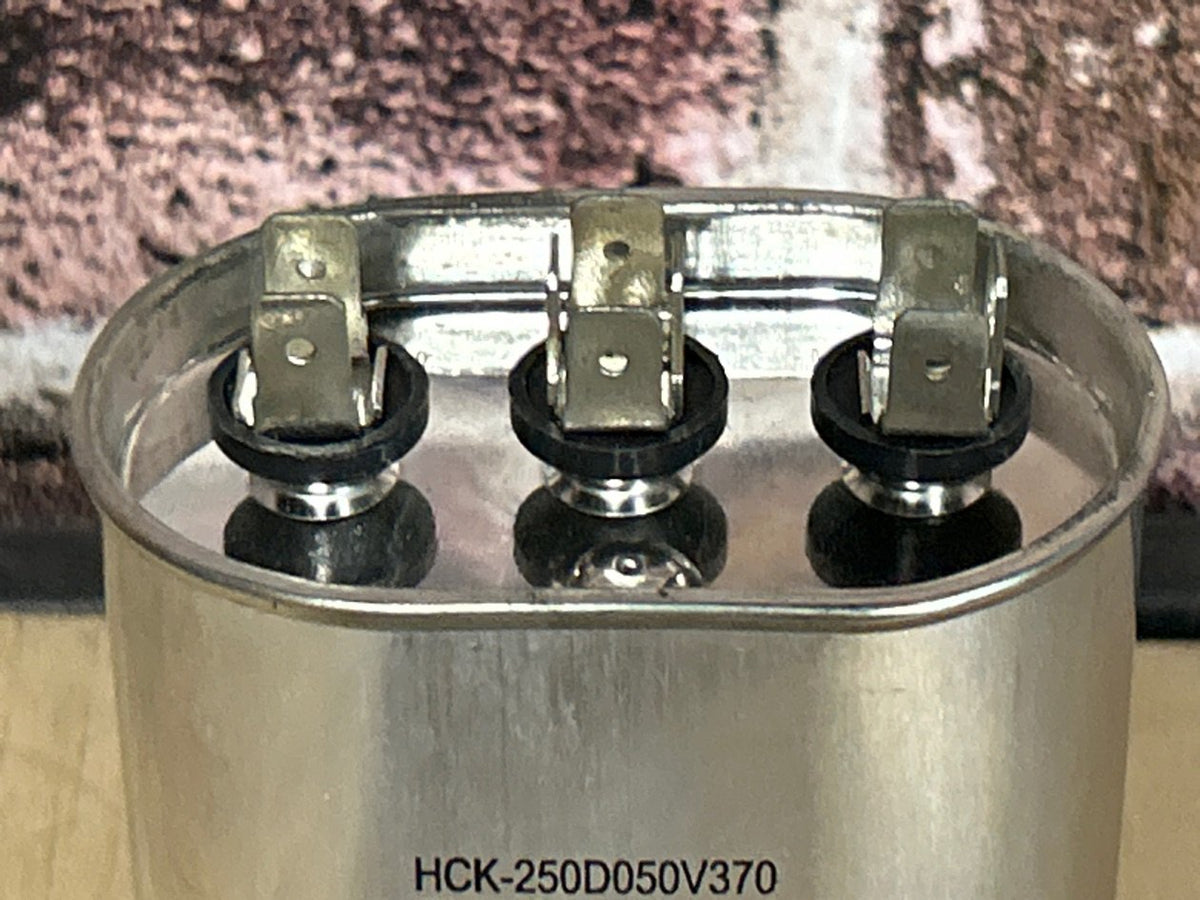 370 Vac, 25+5MFD 50/60 Hz, Oval Capacitor