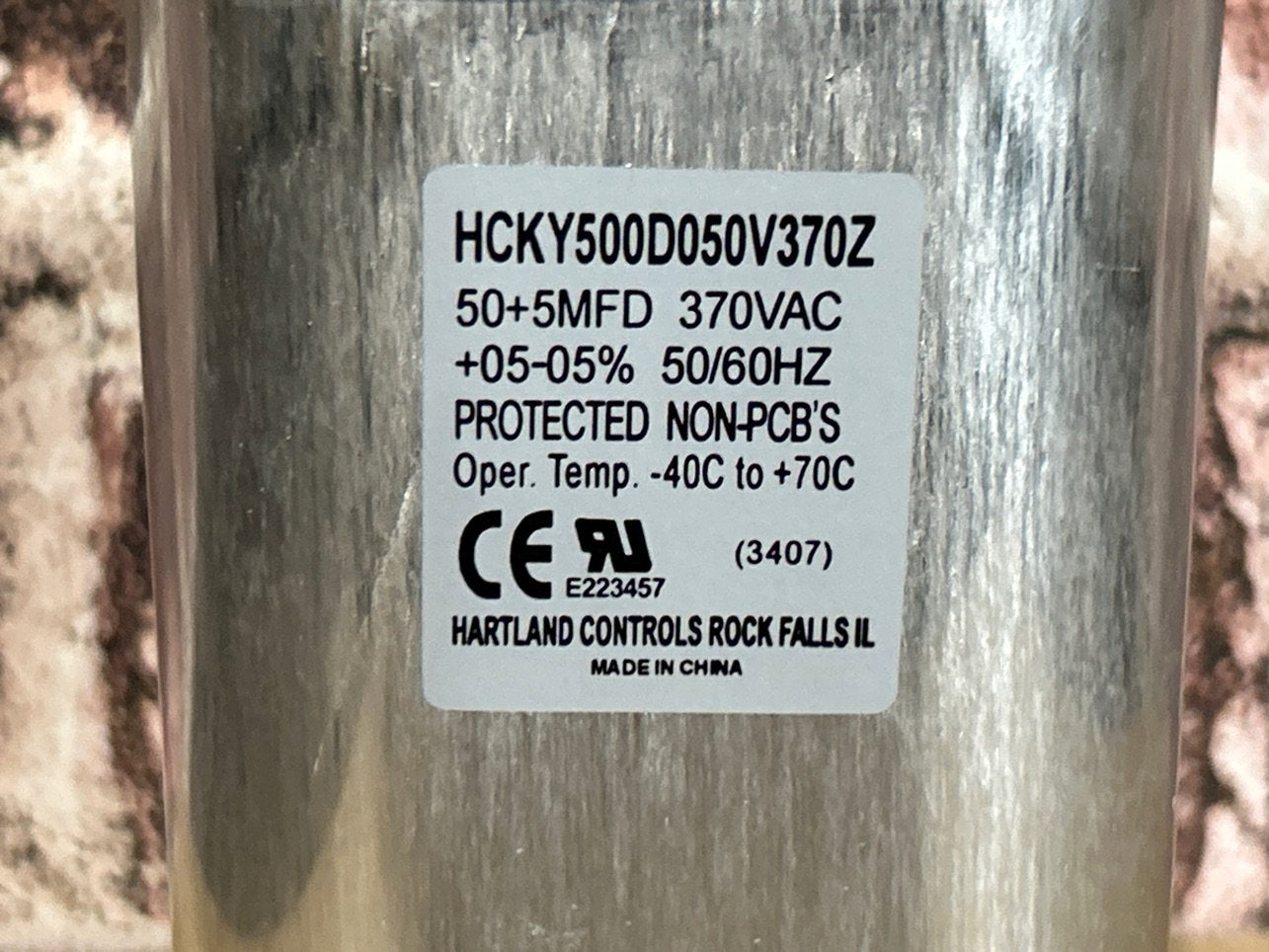 370 Vac, 50+5MFD 50/60 Hz, Oval Capacitor