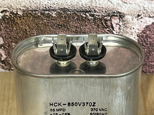 370 Vac, 65MFD 50/60 Hz, Oval Capacitor
