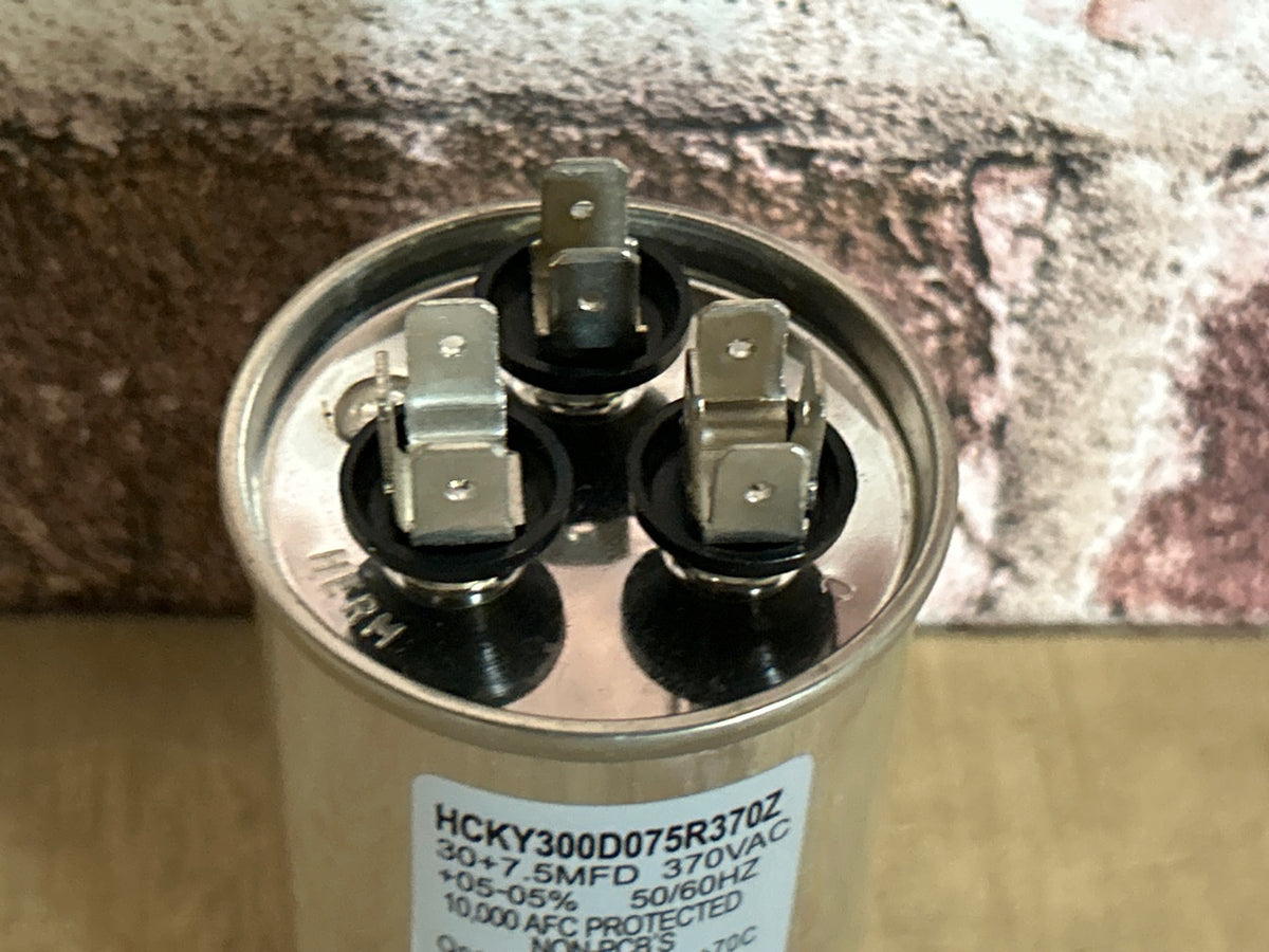 370 Vac, 30+7.5MFD 50/60 Hz, Round Capacitor