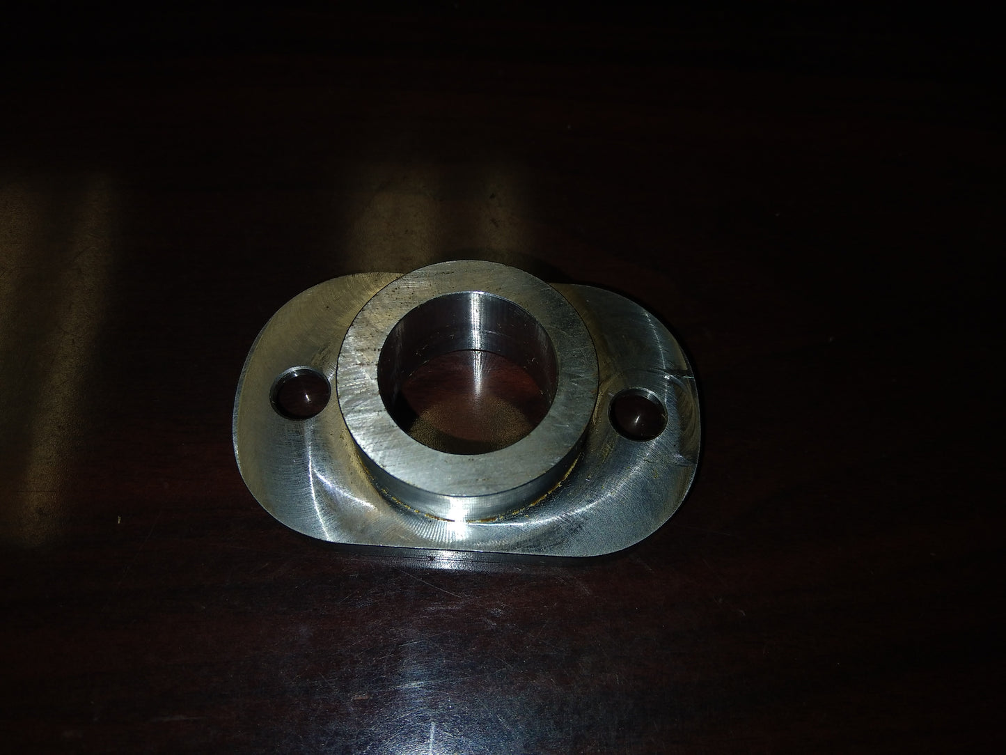 PISTON SHAFT SEAL RETAINER