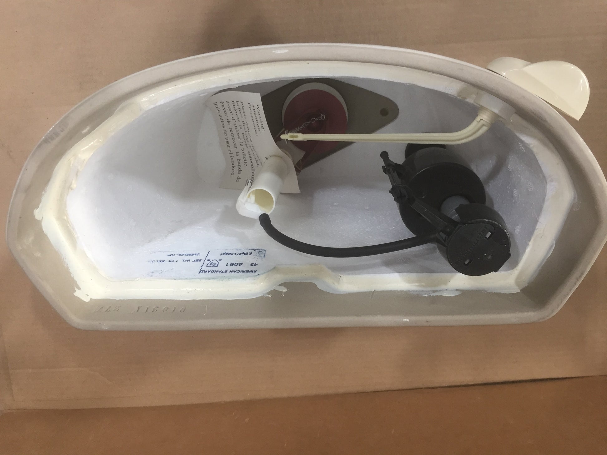 EVOLUTION BONE 1.28 GPF TOILET TANK W/ LEFT HAND TRIP LEVER