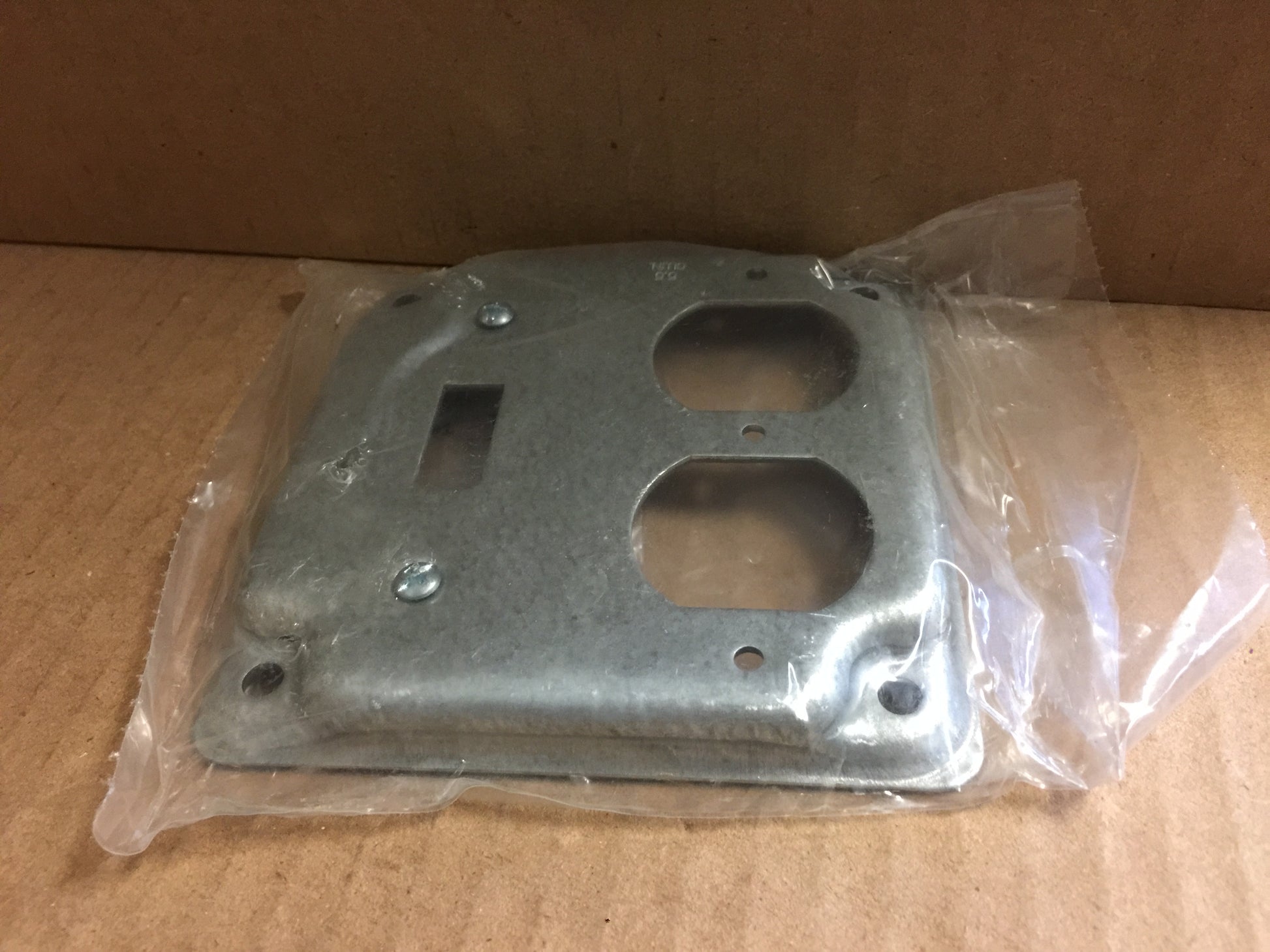 4" FLAT STEEL OUTLET COVER; ONE SWITCH AN ONE DUPLEX RECEPTACLE, SOLD AS 50PK