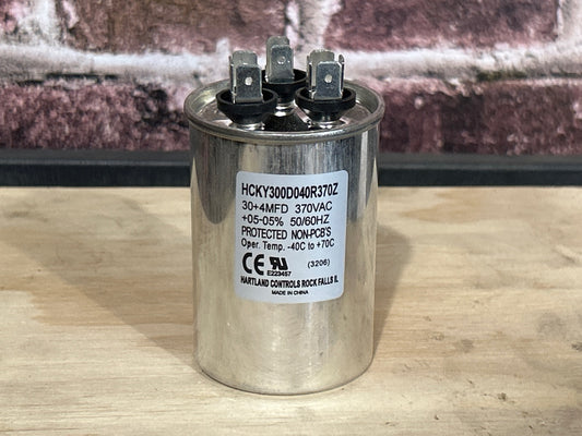 370 Vac, 30+4MFD 50/60 Hz, Round Capacitor