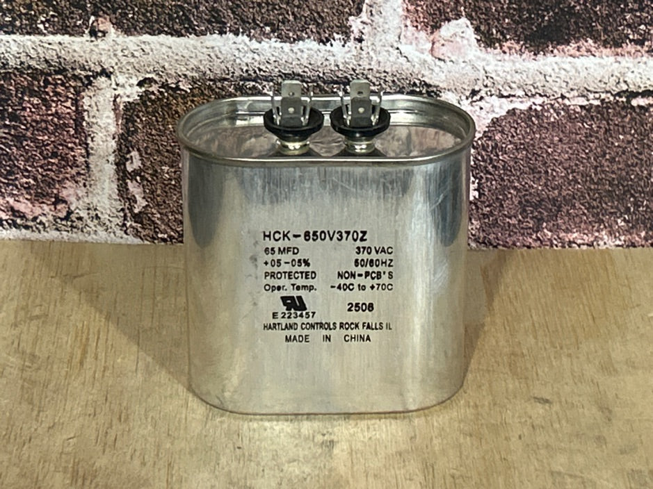 370 Vac, 65MFD 50/60 Hz, Oval Capacitor