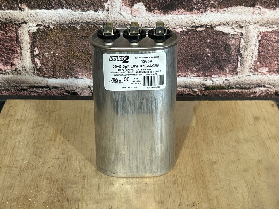 370 Vac, 65+5MFD 50/60 Hz, Round Capacitor